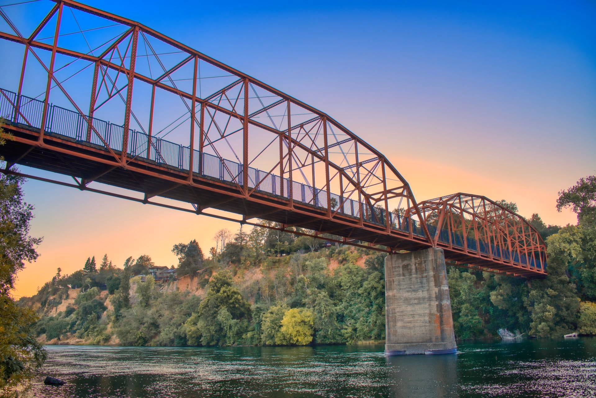 The Fair Oaks Bridge over the American River at sunset