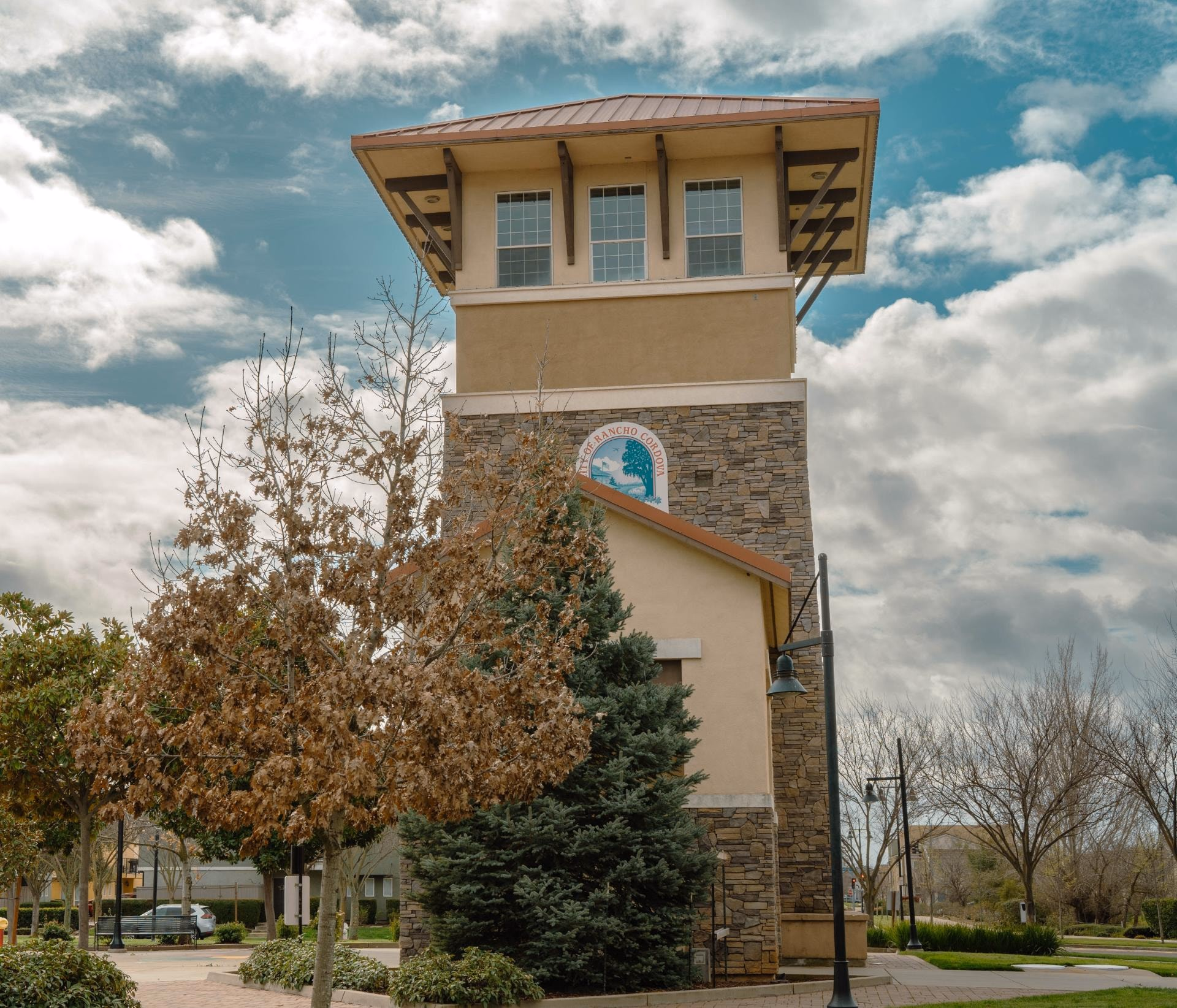 Clock tower framed by trees in Rancho Cordova